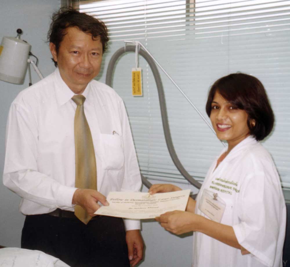 Dr. Jaishree receiving her Fellowship in Laser Surgery from Professor NiwatPolnikorn in Bangkok.